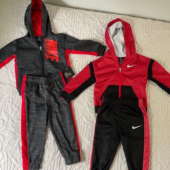pink nike jumpsuit men's